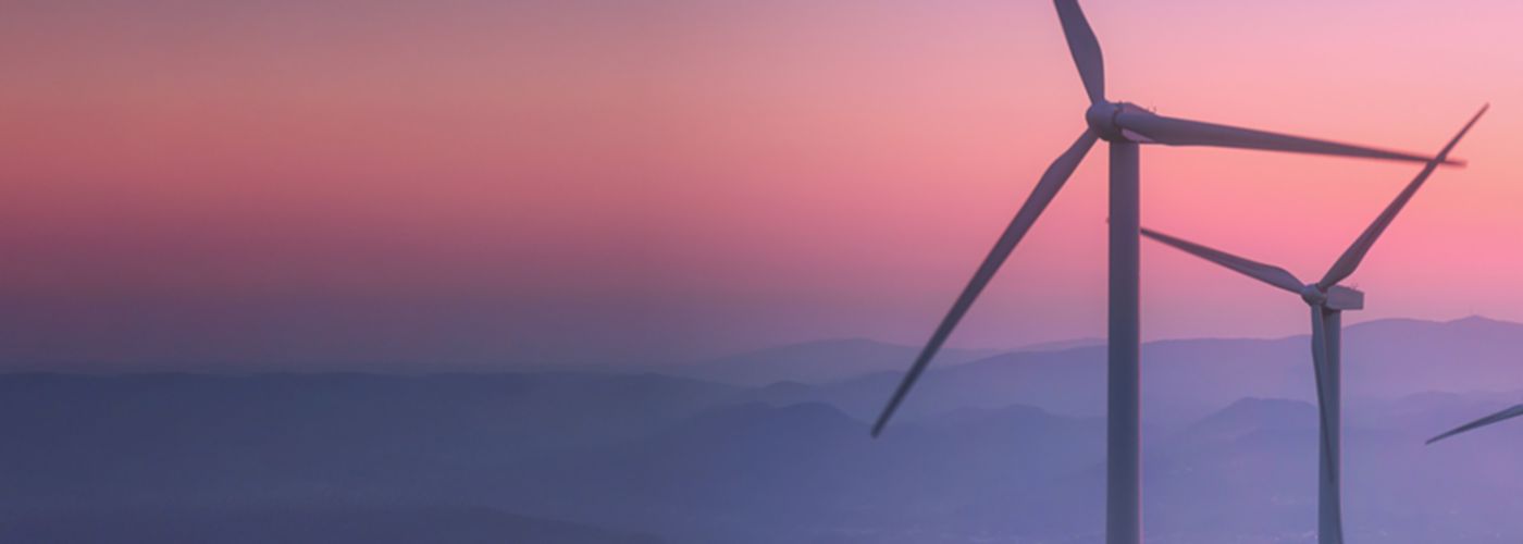 Climate Taxes wind turbines and sunset